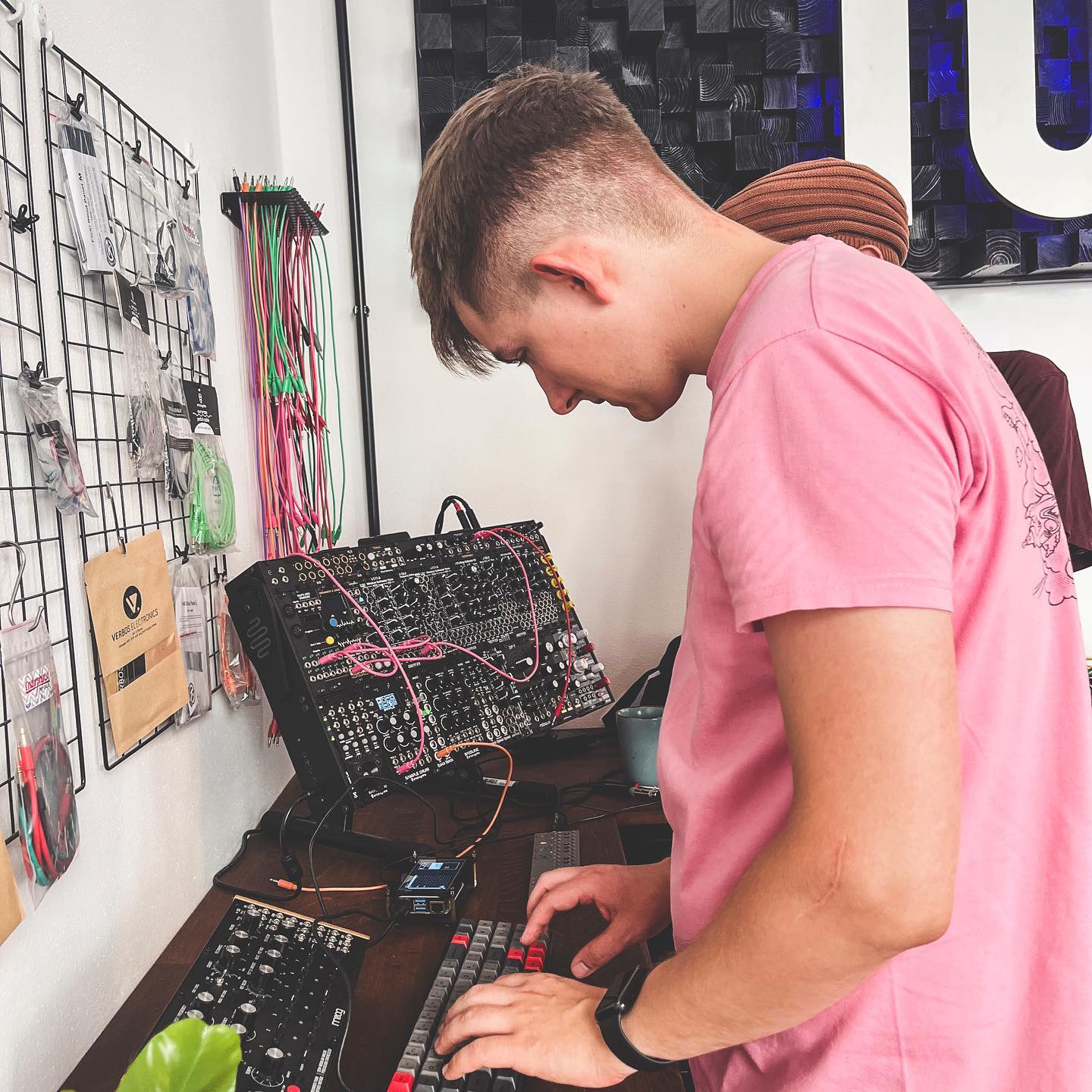 A picture of me showcasing miditracker a local modular synth community meetup